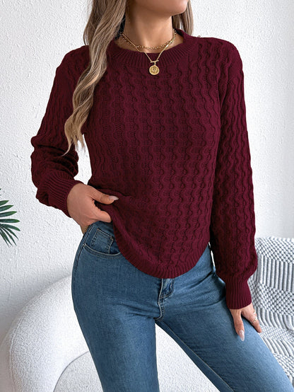 Pull femme manches lanternes torsadées